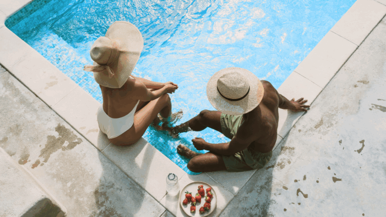 couple-sitting-poolside
